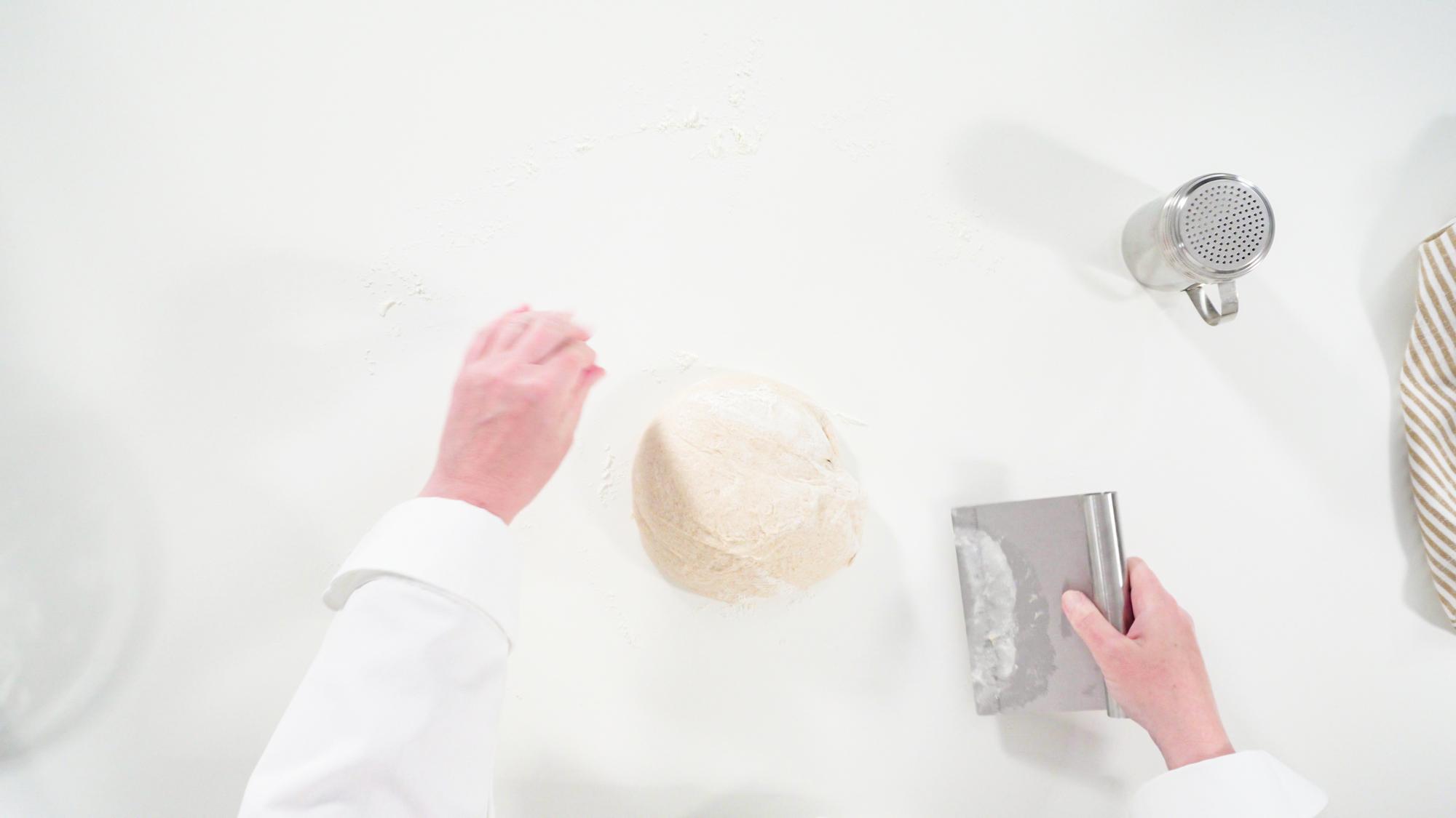 Close-up of pastry technique demonstration